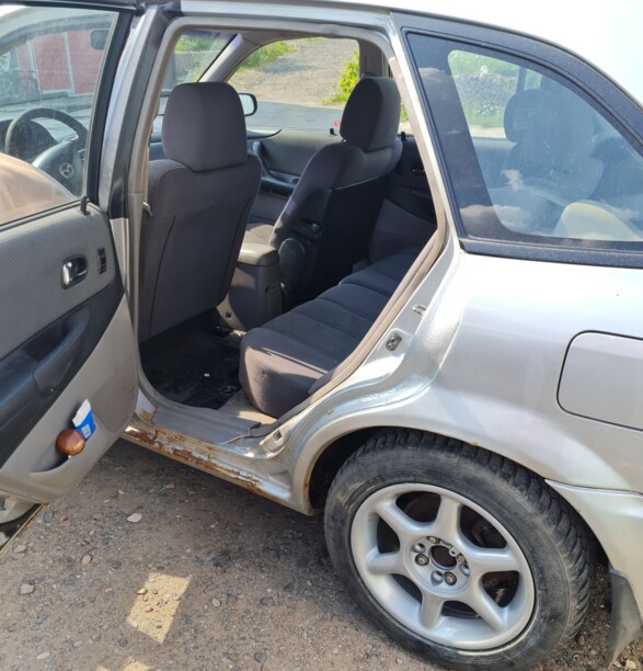 Mazda 323 BJ · Рестайлинг, 2000 г.
