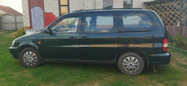 Kia Carnival I, 7 мест, 1999 г.