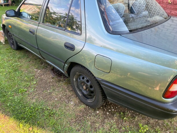 Nissan Sunny N14, 1994 г.