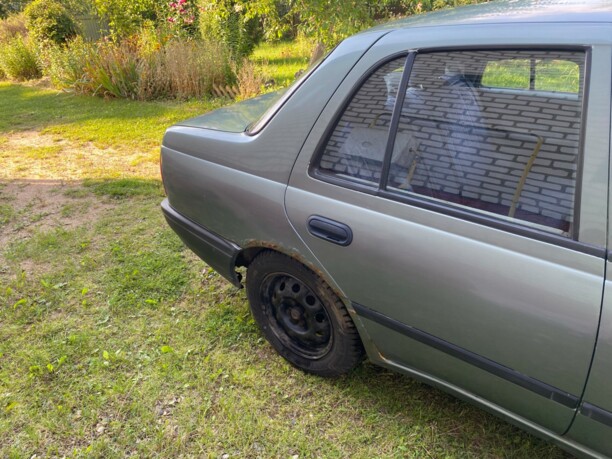 Nissan Sunny N14, 1994 г.