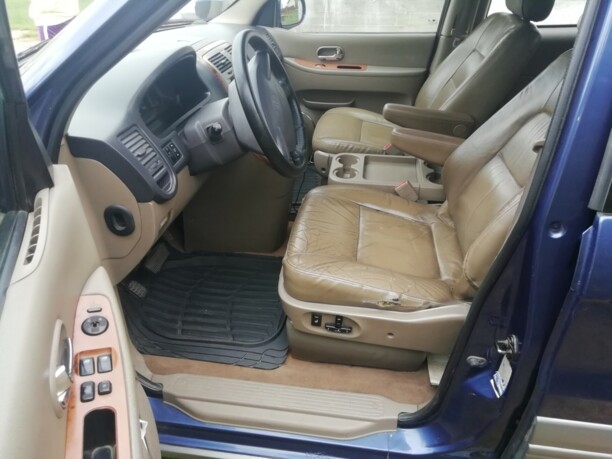 Kia Carnival I · Рестайлинг, 2002 г.