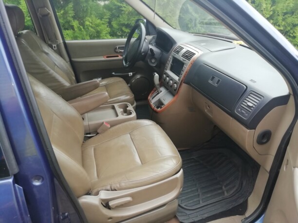 Kia Carnival I · Рестайлинг, 2002 г.