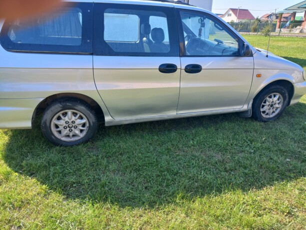 Kia Carnival I, 7 мест, 1998 г.