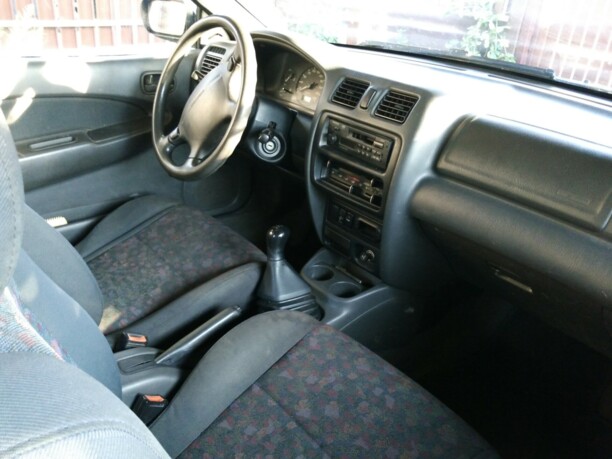 Mazda 323 BA, 1997 г.