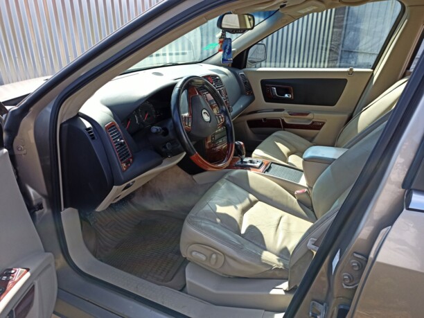 Cadillac SRX I, 2004 г.