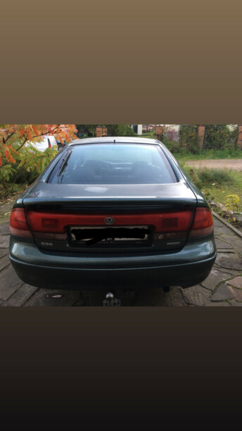 Mazda 626 GE, 1997 г.