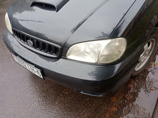 Kia Carnival I, 7 мест, 2000 г.