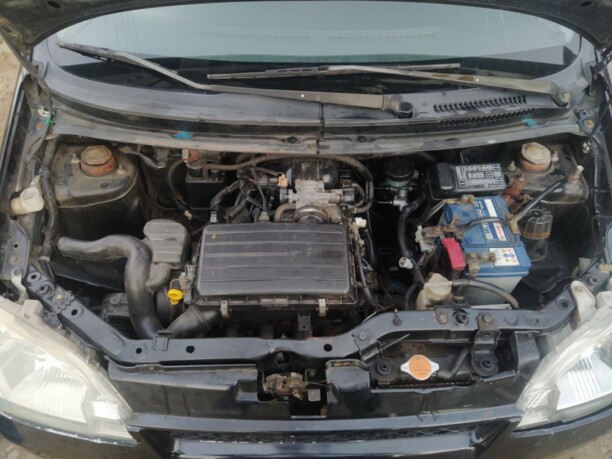 Daihatsu Cuore L251, 2003 г.