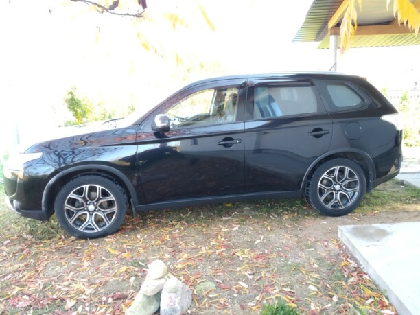 Mitsubishi Outlander III · Рестайлинг, 2014 г.