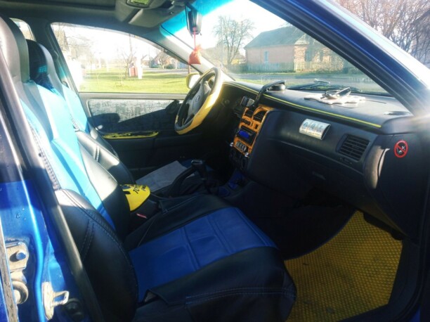 Toyota Carina E, 1997 г.