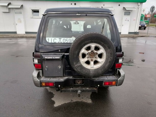 Mitsubishi Pajero II · Рестайлинг, 7 мест, 2002 г.
