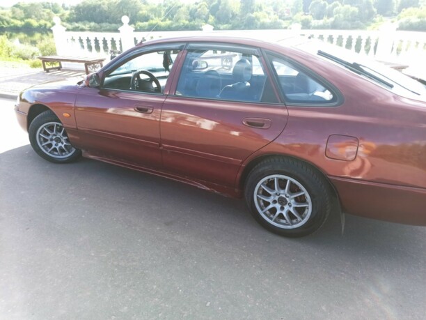 Mazda 626 GE, 1994 г.