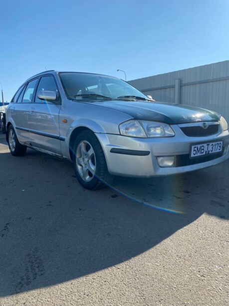 Mazda 323F, 1999 г.