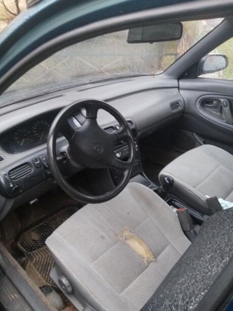Mazda 626 GE, 1993 г.