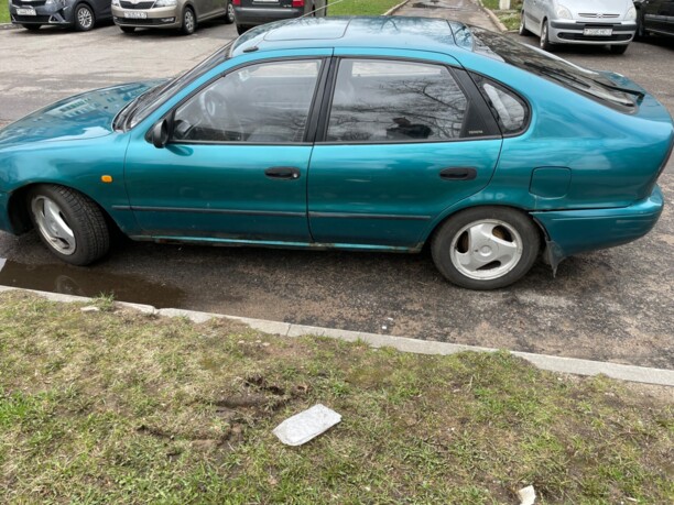 Toyota Corolla VII (E100), 1995 г.