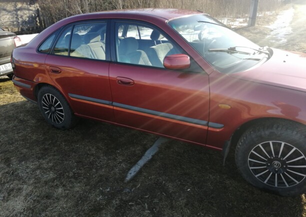 Mazda 626 GF, 1998 г.