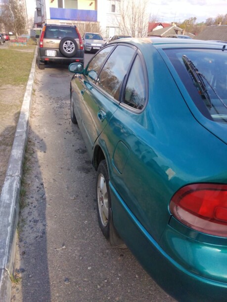 Mazda 626 GE, 1995 г.