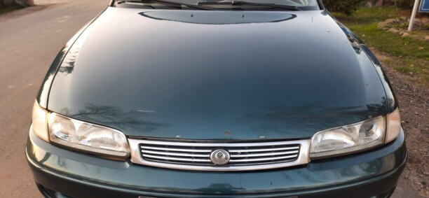 Mazda 626 GE, 1994 г.