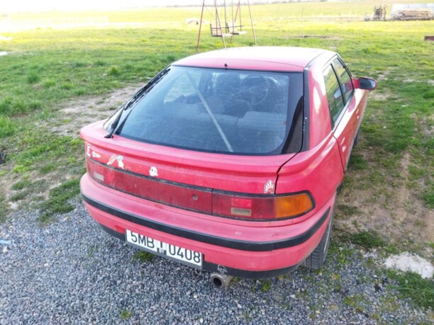 Mazda 323F, 1990 г.