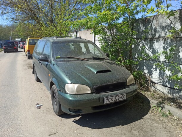 Kia Carnival I, 7 мест, 1999 г.