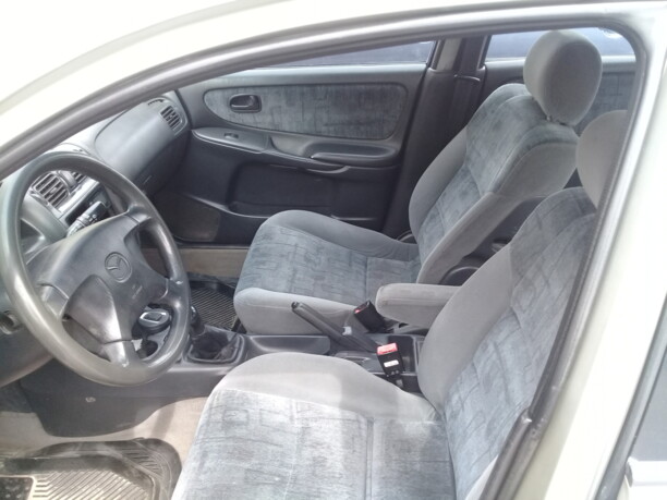 Mazda 626 GE, 1997 г.