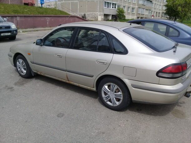 Mazda 626 GE, 1997 г.