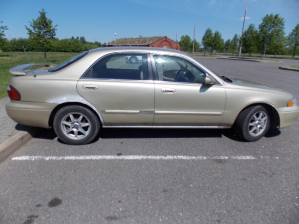 Mazda 626 GF, 1998 г.