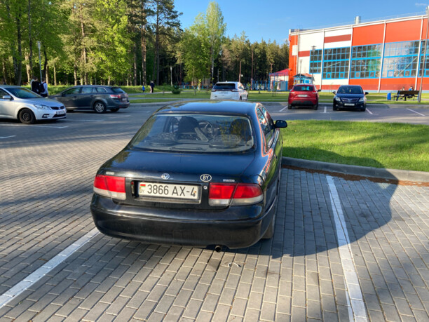 Mazda 626 GE, 1995 г.
