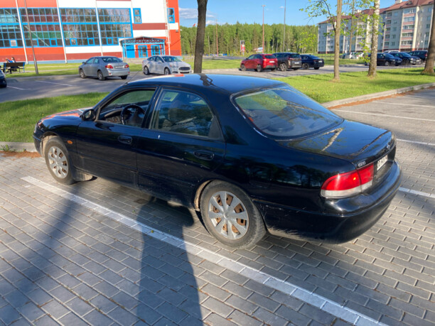 Mazda 626 GE, 1995 г.