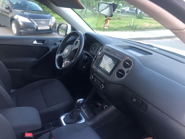 Volkswagen Tiguan I · Рестайлинг, 2014 г.
