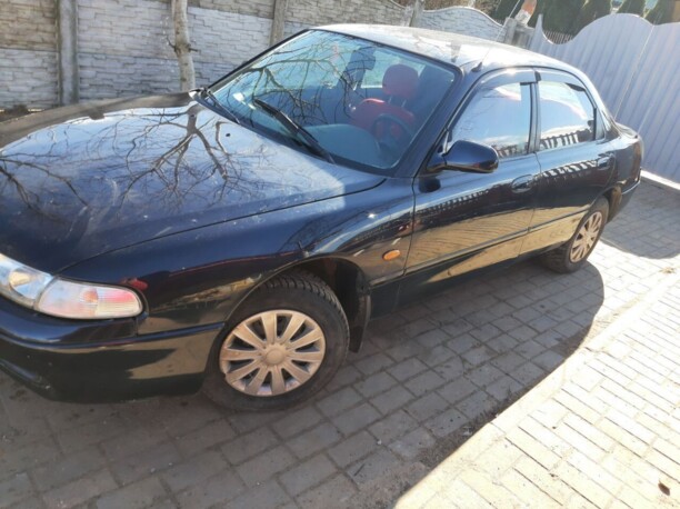 Mazda 626 GE, 1995 г.