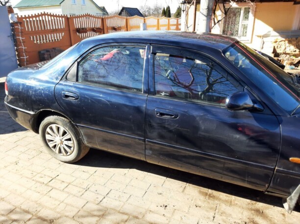 Mazda 626 GE, 1995 г.