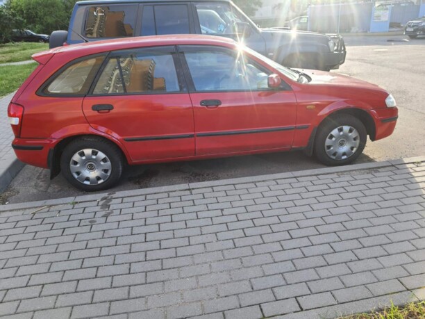 Mazda 323F, 1999 г.
