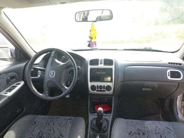 Mazda 323F, 1998 г.