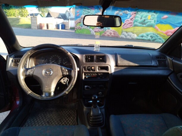 Mazda 323F, 1997 г.