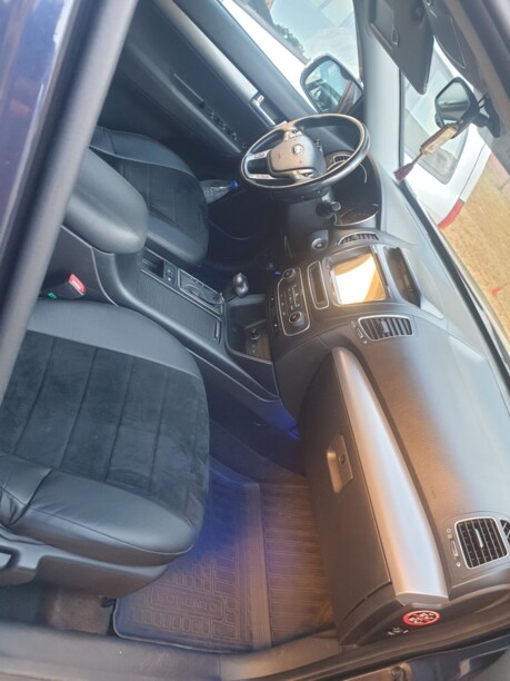 Kia Sorento II · Рестайлинг, 2014 г.