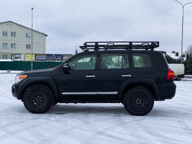 Toyota Land Cruiser J200 · Рестайлинг, 7 мест, 2014 г.