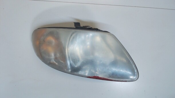 Фара передняя для Dodge Caravan IV 2000 - 2007