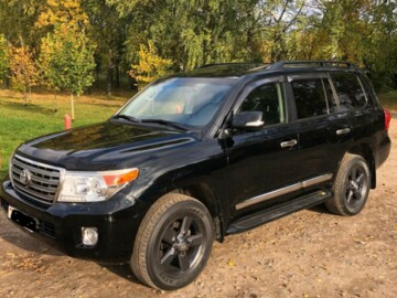 Toyota Land Cruiser J200 · Рестайлинг, 7 мест, 2013 г.