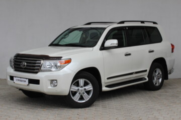 Toyota Land Cruiser J200 · Рестайлинг, 7 мест, 2014 г.
